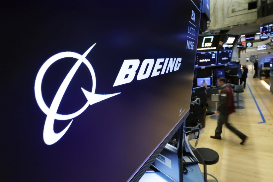 FILE - The Boeing logo appears above a trading post on the floor of the New York Stock Exchange on March 11, 2019.  Boeing has had several production problems with its 787 Dreamliner planes over the last couple years, and now you can add leaky lavatory faucets to the list. Federal regulators say, Friday, April 7, 2023, it's a safety issue because the water can get into electronic equipment bays and damage critical parts.