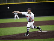 Camas pitcher Ryan McClaskey delivers a pitch in the Papermakers' 2-0 win over Union in a 4A Greater St. Helens League game at Camas High School on Monday, April 17, 2023.