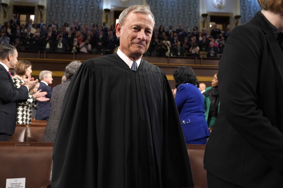 FILE - Chief Justice of the United States John Roberts arrives before President Joe Biden delivers the State of the Union address to a joint session of Congress at the Capitol, Tuesday, Feb. 7, 2023, in Washington. The Democratic chairman of the Senate Judiciary has invited Supreme Court Justice John Roberts to testify next month at a hearing on ethics standards.