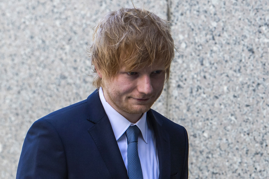 Ed Sheeran walks into Manhattan federal court, Tuesday, April 25, 2023, in New York.  The heirs of Ed Townsend, Marvin Gaye's co-writer of the 1973 soul classic, sued Sheeran, alleging the English pop star's hit 2014 tune has "striking similarities" to "Let's Get It On" and "overt common elements" that violate their copyright.