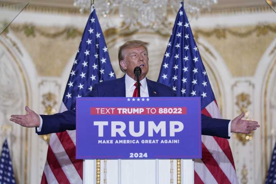 FILE - Former President Donald Trump speaks at his Mar-a-Lago estate on April 4, 2023, in Palm Beach, Fla., after being arraigned earlier in the day in New York City. After his initial court appearance in the New York case, the first of several in which he is in legal jeopardy, Trump ticked through the varied investigations he was facing and branded them as "massive" attempts to interfere with the 2024 election.