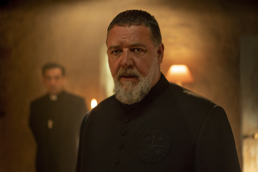 This image released by Sony Pictures shows Russell Crowe as Father Gabriele Amorth in a scene from Screen Gems' "The Pope's Exorcist." (Jonathan Hession/Sony Pictures via AP)