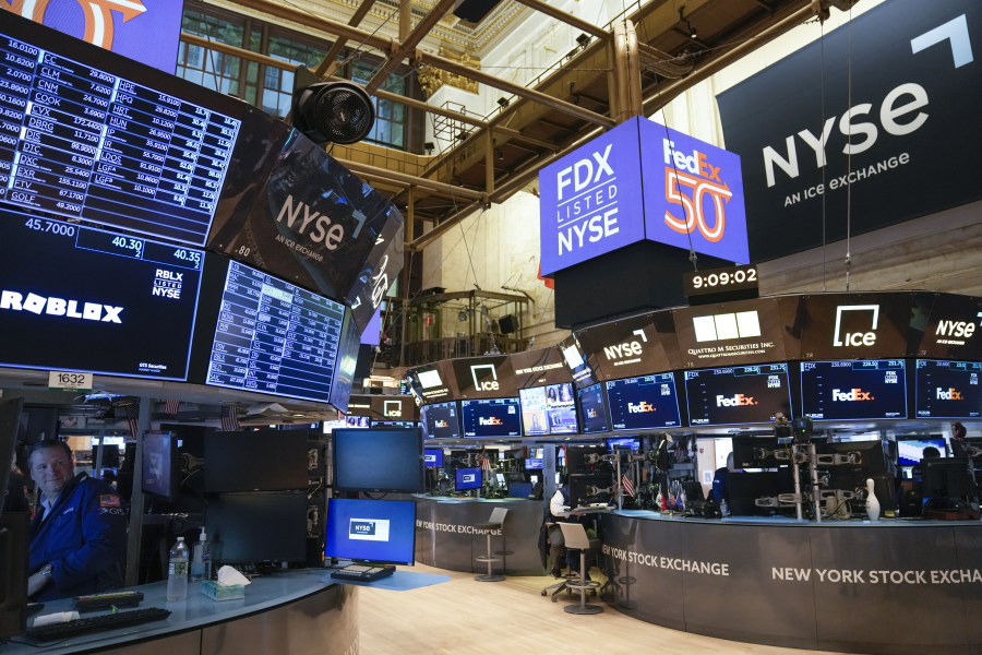 Traders work on the floor at the New York Stock Exchange in New York, Monday, April 17, 2023.