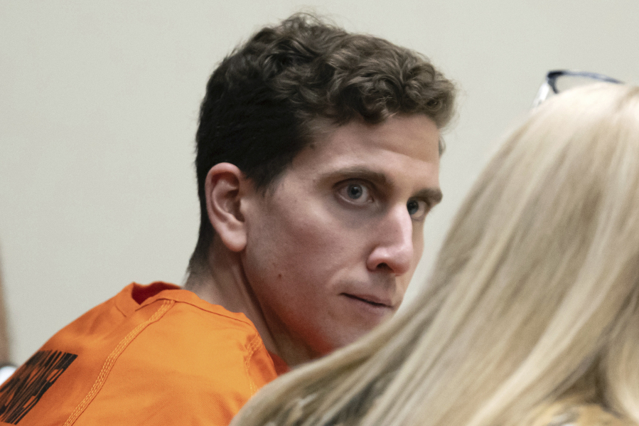 FILE - Bryan Kohberger, left, who is accused of killing four University of Idaho students in November 2022, looks toward his attorney, during a hearing in Latah County District Court, Jan. 5, 2023, in Moscow, Idaho. The Idaho Supreme Court on Monday, April 24, 2023, rejected a request by 30 news organizations to lift a gag order in the criminal case of Kohberger. (AP Photo/Ted S.