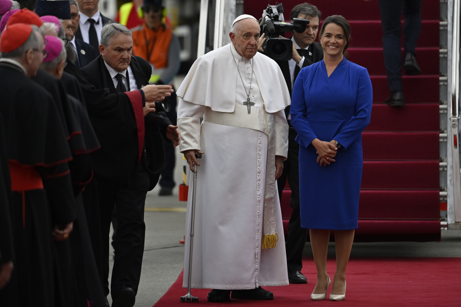 Pope Francis is greeted by Hungary President Katalin Novak during the farewell ceremony at the Budapest International Airport in Budapest, Hungary, Sunday, April 30, 2023.