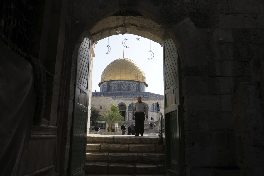 A Palestinian worshiper leaves the Al-Aqsa Mosque compound following a raid of the site in the Old City of Jerusalem during the Muslim holy month of Ramadan, Wednesday, April 5, 2023.