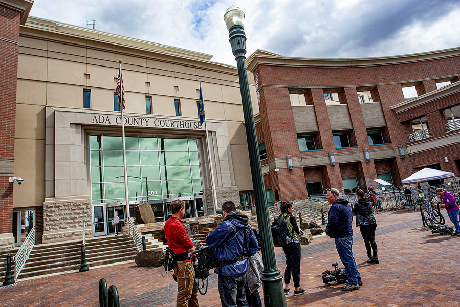 Members of the media gather outside the Ada County Courthouse as Lori Valley Daybell's murder trial continues in Boise, Idaho, Tuesday, April 11, 2023.