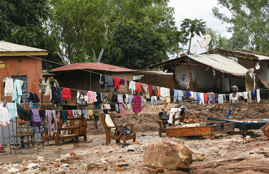 Clothes are hung out to dry on called electrical power lines caused by last week's heavy rains caused by Tropical Cyclone Freddy in Phalombe, southern Malawi Saturday, March 18, 2023. Authorities are still getting to grips with destruction in Malawi and Mozambique with over 370 people confirmed dead and several hundreds still displaced or missing.