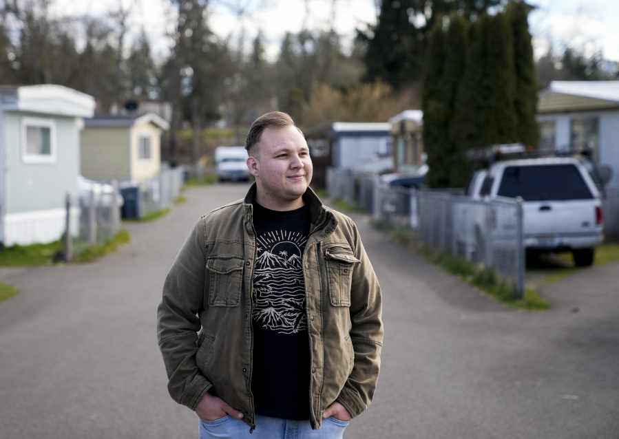Resident and board member of the mobile home park Bob's and Jamestown Homeowners Cooperative, Gadiel Galvez, 22, poses for a portrait in his neighborhood on Saturday, March 25, 2023, in Lakewood, Wash. When residents learned the park's owner was looking to sell, they formed a cooperative and bought it themselves amid worries it would be redeveloped. Since becoming owners in September 2022, residents have worked together to manage and maintain the park.