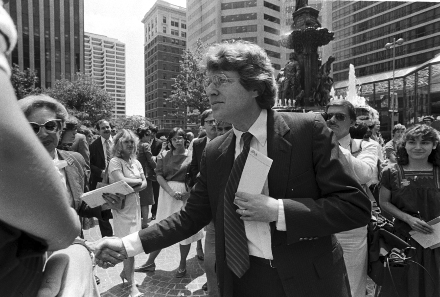 FILE - Democratic gubernatorial candidate Jerry Springer greets supporters at a rally on Fountain Square in Cincinnati, Ohio on June 3, 1982. Springer, the former Cincinnati mayor and news anchor whose namesake TV show unleashed strippers, homewreckers and skinheads to brawl and spew obscenities on weekday afternoons, has died. He was 79. A family spokesperson died Thursday at home in suburban Chicago.