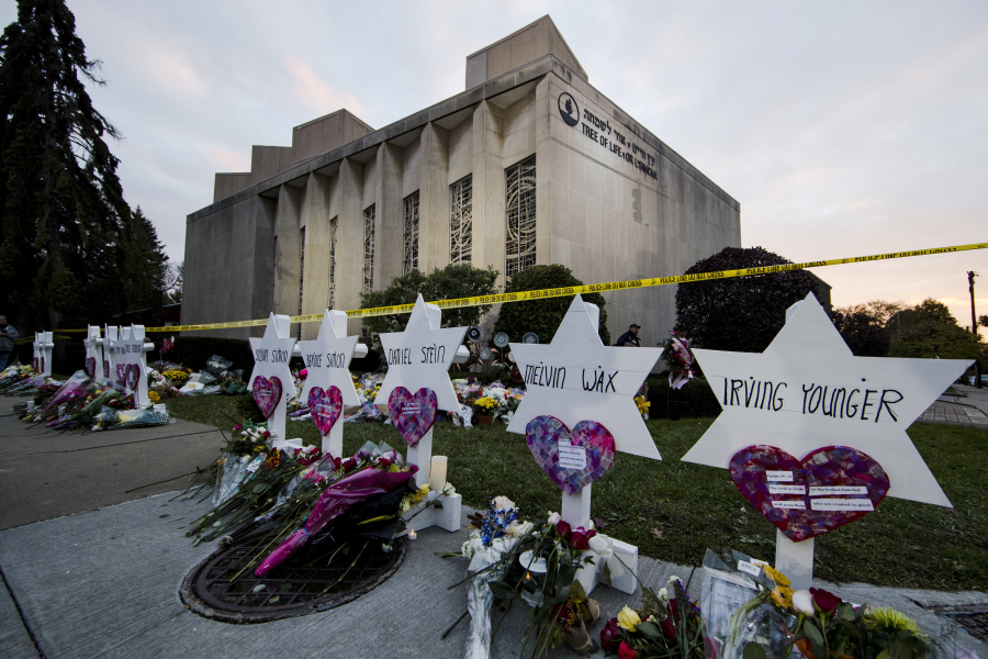 FILE - A makeshift memorial stands outside the Tree of Life Synagogue in the aftermath of a deadly shooting in Pittsburgh, Oct. 29, 2018. The man charged in the deadliest antisemitic attack in U.S. history has for years been trying unsuccessfully to avoid having a federal jury decide whether to convict him of shooting to death 11 people during services in a Pittsburgh synagogue, a trial scheduled to get underway with jury selection in less than two weeks.