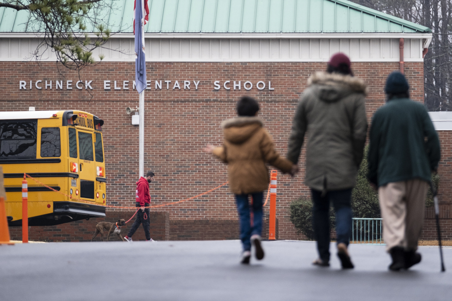 FILE - Students return to Richneck Elementary on Jan. 30, 2023, in Newport News, Va. A grand jury in Virginia has indicted the mother of a 6-year-old boy who shot his teacher on charges of child neglect and failing to secure her handgun in the family's home, a prosecutor said Monday, April 10.