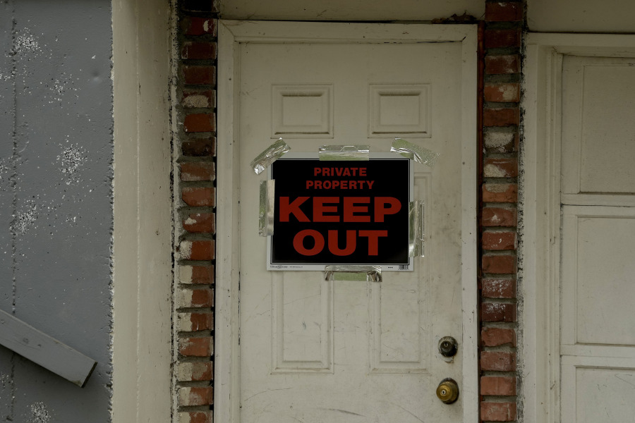A keep out sign is posted on a home, Wednesday, April 19, 2023, near the house where 84-year-old Andrew Lester shot 16-year-old Ralph Yarl a week earlier in Kansas City, Mo.