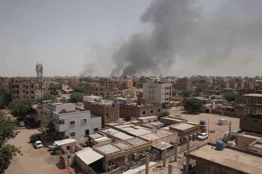 Smoke is seen rising from Khartoum's skyline, Sudan, Sunday, April 16, 2023. The Sudanese military and a powerful paramilitary group battled for control of the chaos-stricken nation for a second day Sunday, signaling they were unwilling to end hostilities despite mounting diplomatic pressure to cease fire.