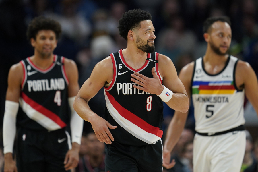 Portland Trail Blazers guard Skylar Mays (8) reacts after a Trail Blazers turnover during the first half of an NBA basketball game against the Minnesota Timberwolves, Sunday, April 2, 2023, in Minneapolis.