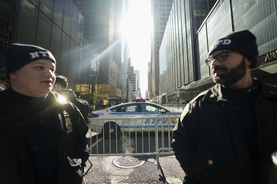 Members of the NYPD block 56th Street, near Trump Tower, Monday, April 3, 2023 in New York. Former President Donald Trump is expected to travel to New York to face charges related to hush money payments. Trump is facing multiple charges of falsifying business records, including at least one felony offense, in the indictment handed up by a Manhattan grand jury.