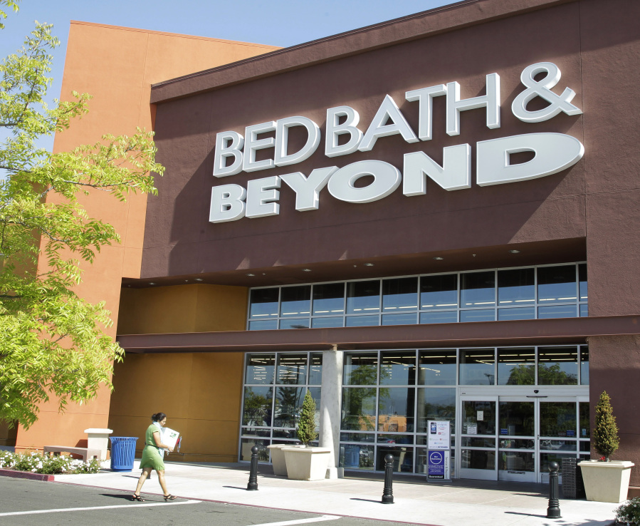 FILE - A Bed Bath & Beyond customer enters a store in Mountain View, Calif., Wednesday, May 9, 2012. Bed Bath & Beyond has filed for bankruptcy protection, but the company says its stores and websites will remain open and continue serving customers. The beleaguered home goods chain made the filing Sunday, April 23, 2023 in U.S. District Court in New Jersey, listing its estimated assets and liabilities in the range of $1 billion and $10 billion.