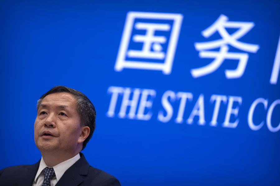 Shen Hongbing, the director of the Chinese Center for Disease Control and Prevention, speaks at a press conference on the origins of COVID-19 at the State Council Information Office in Beijing, Saturday, April 8, 2023.