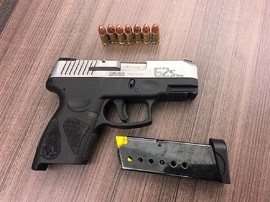 A gun Portland police say fell from the pocket of a 16-year-old boy Saturday as he allegedly ran away from officers and a stolen car. The car was reportedly stolen at gunpoint in Vancouver.