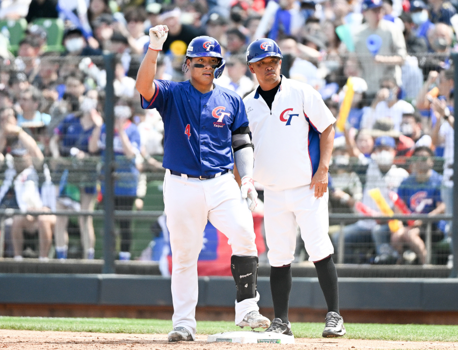 Kungkuan Giljegiljaw (4) of Chinese Taipei reacts after hitting a single at the top of the second inning during the World Baseball Classic Pool A game between Chinese Taipei and Cuba at Taichung Intercontinental Baseball Stadium on March 12, 2023 in Taichung, Taiwan.