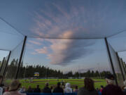 The sunset illuminates a cloud over the Ridgefield Outdoor Recreation Complex on Tuesday, July 12, 2022. The 2023 Ridgefield Raptors baseball season is just a few weeks away.