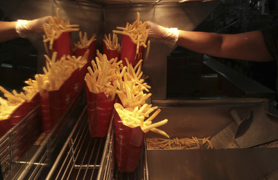 Fries are filled for customers's orders at a Chicago McDonald's location.