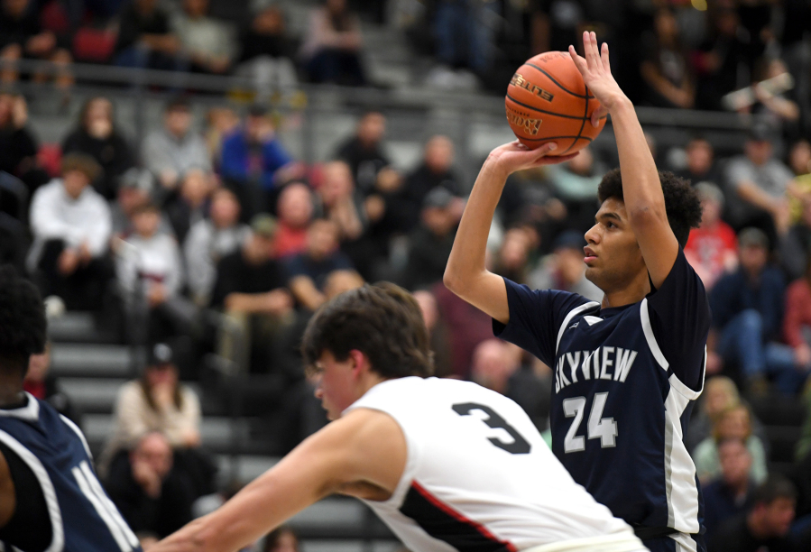 Skyview senior Joshua Chatman, right, shoots a free throw Friday, Jan. 6, 2023, during the Storm?s 61-41 loss to Union at Union High School.
