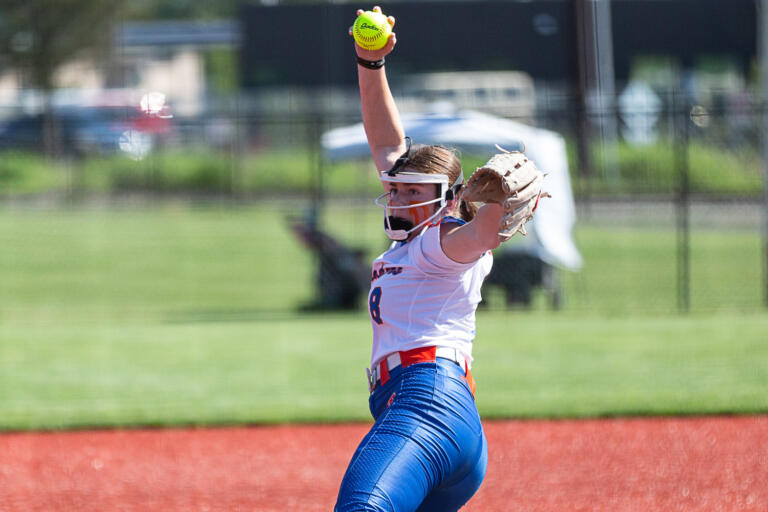 Ridgefield's Elizabeth Peery winds up to deliver a pitch against W.F. West in the 2A District 4 quarterfinals May 18 at Rec Park in Chehalis.