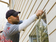 Protecting edges and working around windows and doors are important parts of home painting.
