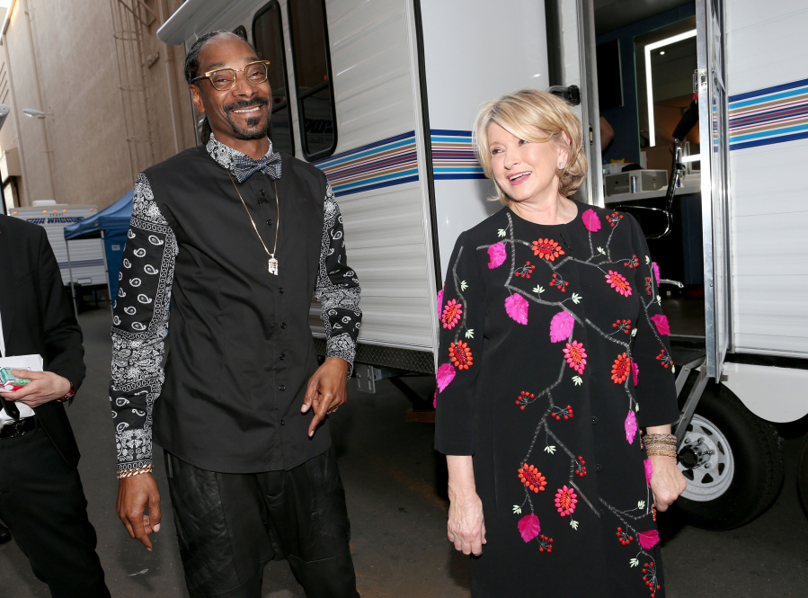 Rapper Snoop Dogg, left, and TV personality Martha Stewart attend the Comedy Central Roast of Justin Bieber at Sony Pictures Studios on March 14, 2015, in Los Angeles.