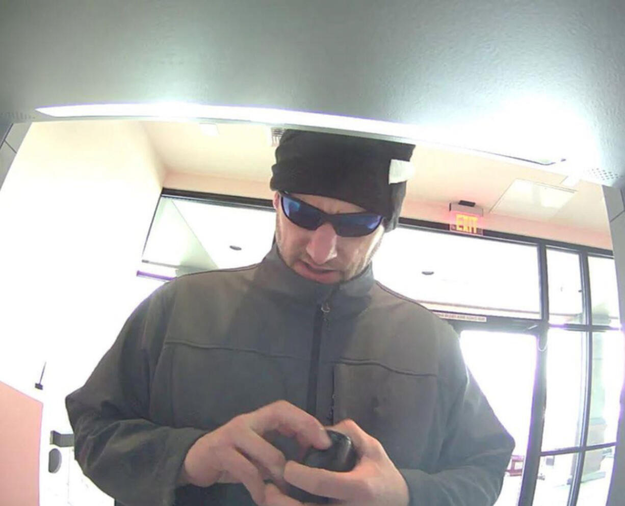 Clark County sheriff's deputies are seeking the public's help identifying a man who's a person of interest in the theft of a debit card.