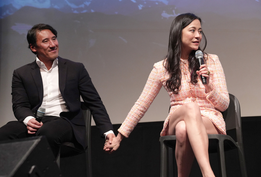 Co-directors/producers Jimmy Chin, left, and Elizabeth Chai Vasarhelyi speak onstage during the New York premiere of "Wild Life" on April 11. (Ilya S.