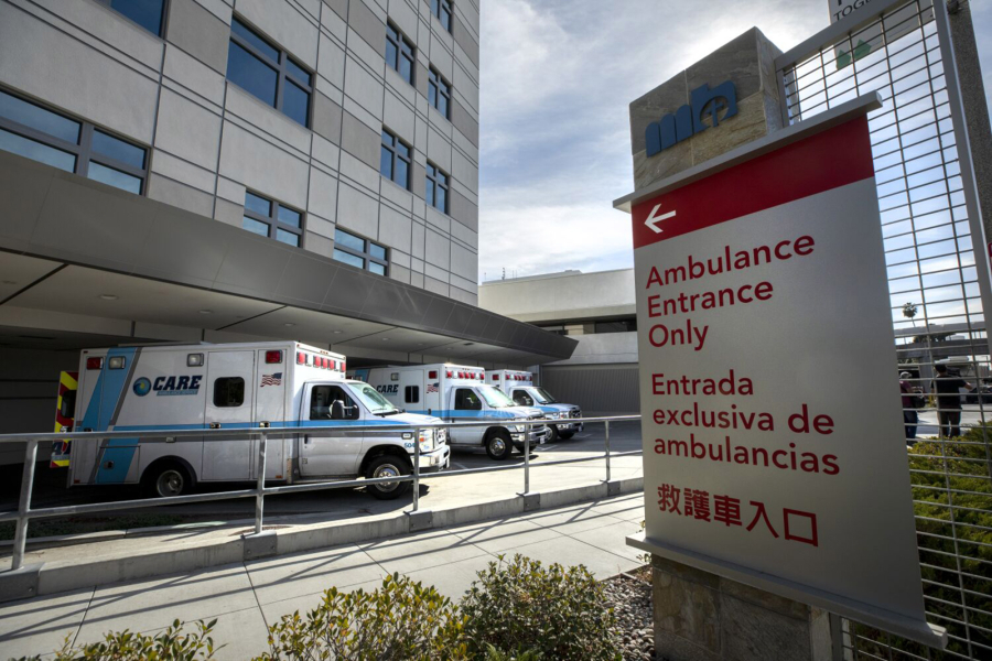 Ambulances deliver patients to Methodist Hospital in Arcadia. The hospital said it met the criteria for crisis care mode as it is now caring for 233 patients, more than half for COVID positive in isolation. Photographed at Arcadia on Wednesday, Jan. 6, 2021, in Arcadia, California. (Myung J.