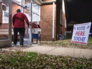 A voter arrives at the Veterans of Foreign Wars Post 3103 polling location on Nov. 8, 2022, in Fredericksburg, Virginia. After months of candidates campaigning, Americans are voting in the midterm elections to decide close races across the nation.
