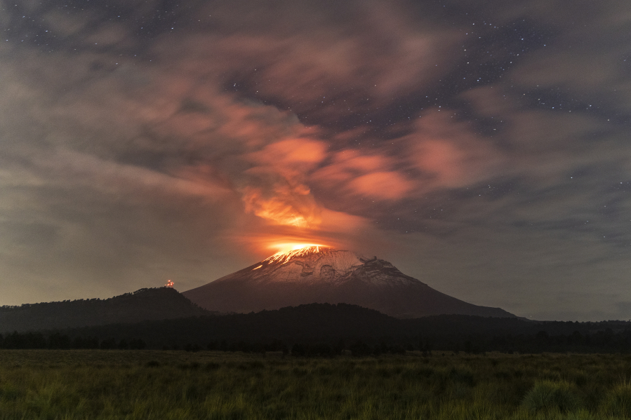 Popocatepetl volcano spews incandescent material as seen from Paso de Cort?(C)s on May 23, 2023, in Amecameca, Mexico. The second highest volcano in the country increased its activity while Mexican authorities raised the alert to yellow phase 3. Popocatepetl volcano caused the fall of ashes in different municipalities in Puebla, Estado de Mexico and Mexico City.