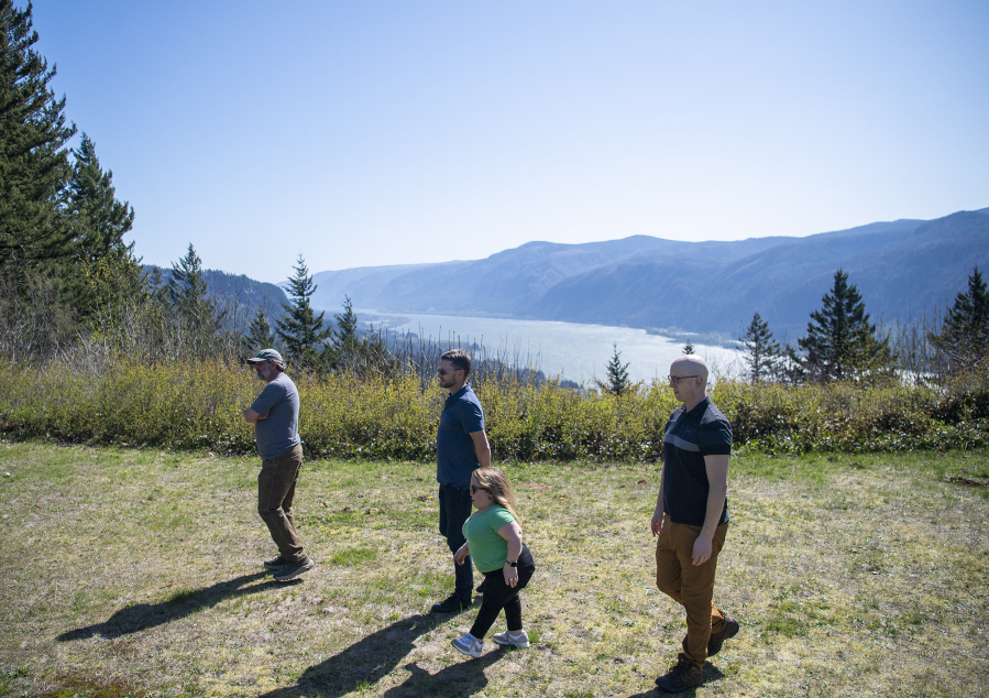 Friends of the Columbia Gorge land trust director Dan Bell, left, landscape architect Jeramie Shane and senior designer Margaret Drew of Mayer/Reed and Friends communications director Tim Dobyns explore the Cape Horn Preserve. The site will get a new overlook and many accessible, inclusive amenities in years to come.
