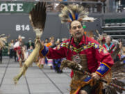 Vancouver resident Ed Wulf dances in the grand entry parade at the 50th Naimuma Powwow at Portland State University on May 6. On Saturday, he will serve as arena director at the Native American Parent Association of Southwest Washington Annual Traditional Pow-Wow at Clark College.