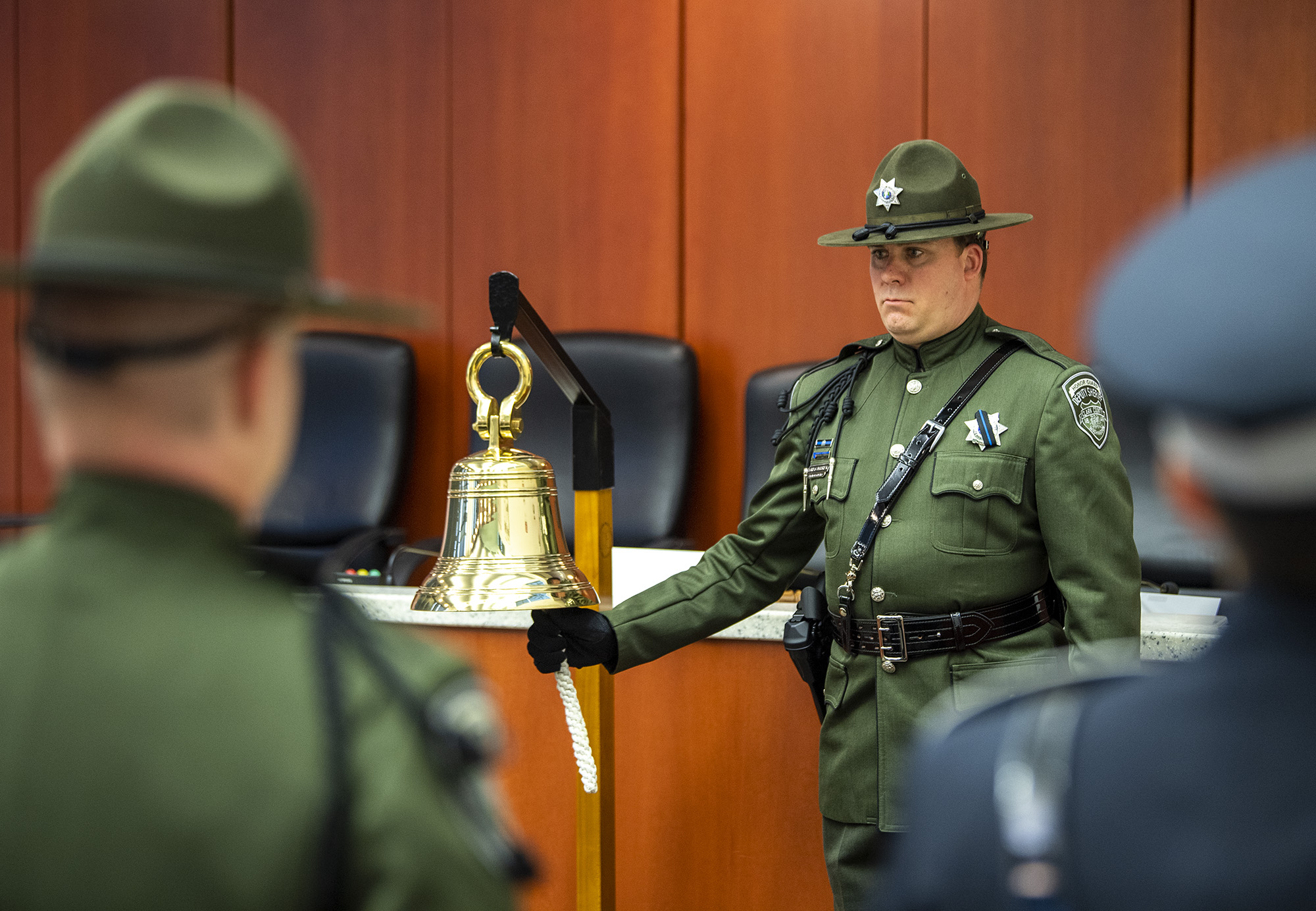 Honor Guard members perform a bell ringing ceremony on Thursday, May 18, 2023, during the Clark County Law Enforcement Memorial Ceremony at the Vancouver Public Service Center.
