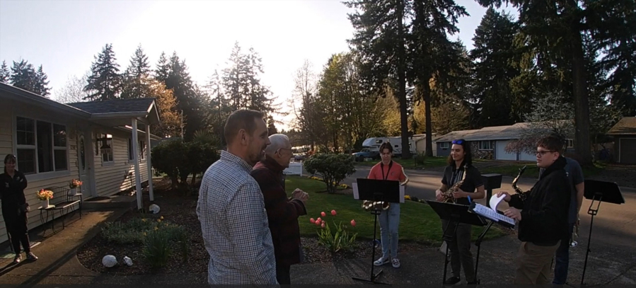 Longtime Vancouver resident and former Fort Vancouver High School band teacher Ray Johnson was surprised by the Washougal High School jazz ensemble with a special performance at his home's driveway.