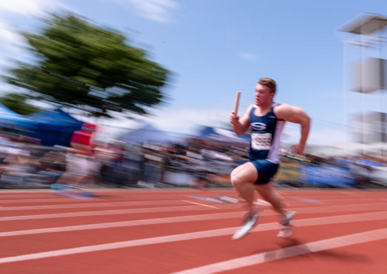 Skyview’s Colby Warner sprints the opening leg of the 4x100-meter relay at the WIAA 2A/3A/4A State Track and Field Championships on Saturday, May 27, 2023, at Mount Tahoma High School in Tacoma.