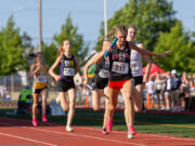 Camas’ Eliisa Marshall stretches for the finish as the Papermakers won the 4A girls 4x400 relay at the WIAA 2A/3A/4A State Track and Field Championships on Saturday, May 27, 2023, at Mount Tahoma High School in Tacoma.
