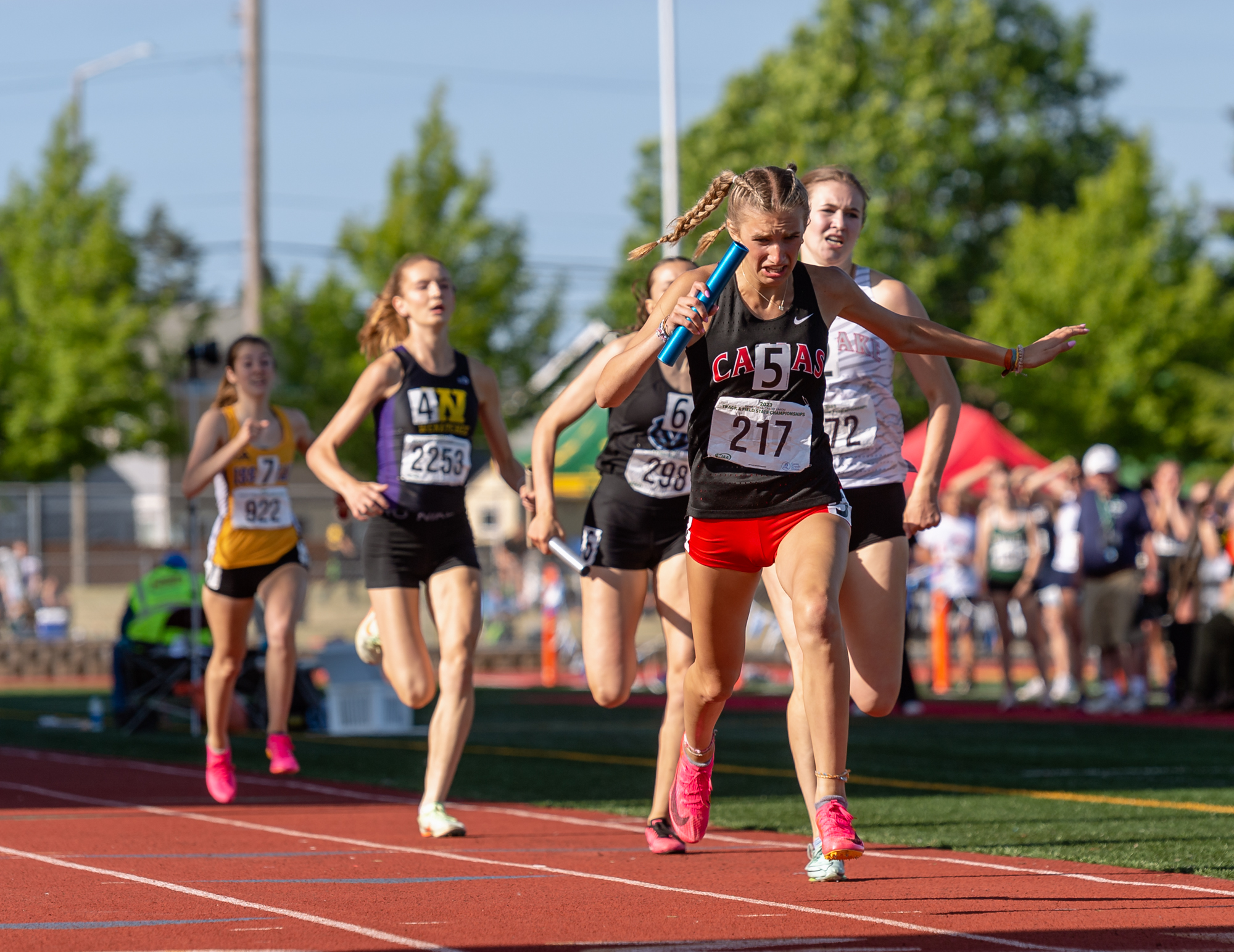 Camas’ Eliisa Marshall stretches for the finish as the Papermakers won the 4A girls 4x400 relay at the WIAA 2A/3A/4A State Track and Field Championships on Saturday, May 27, 2023, at Mount Tahoma High School in Tacoma.