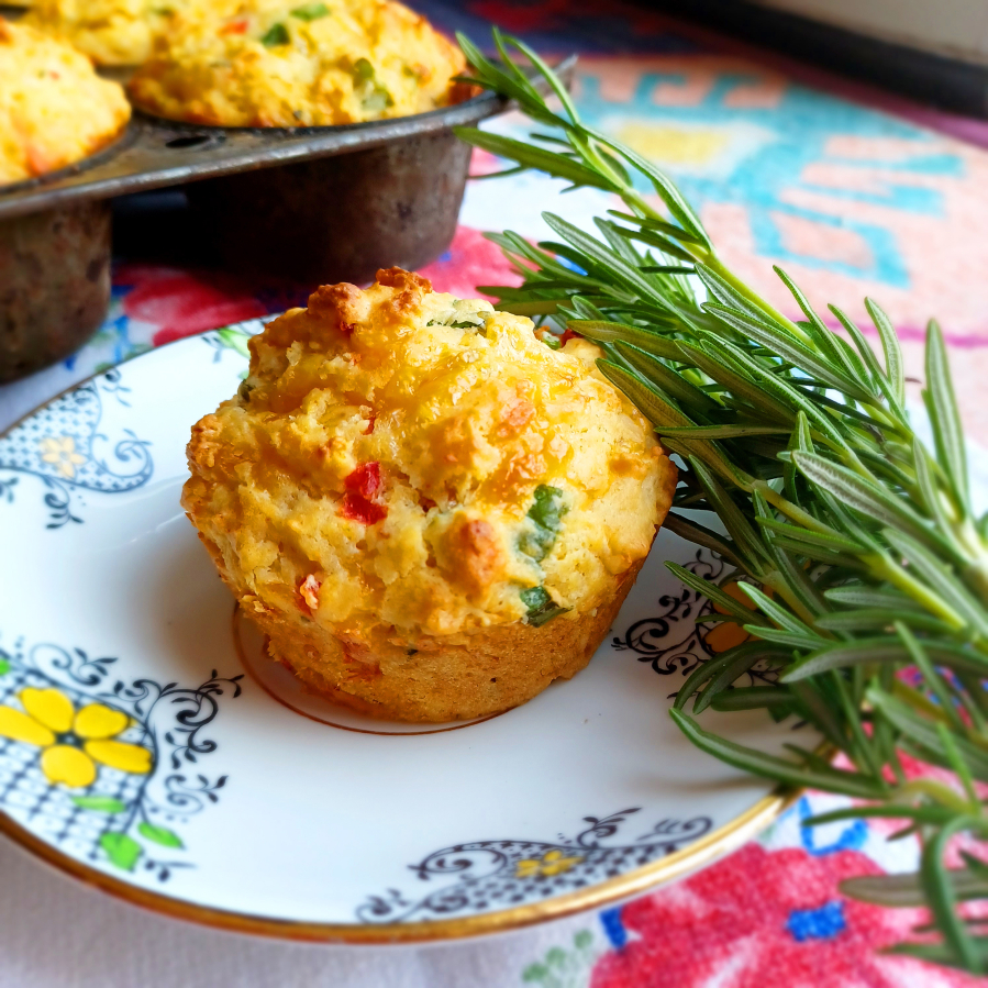 With sharp cheddar cheese, grated Parmesan, pimientos, scallions and two tablespoons of fresh rosemary, these muffins are practically a meal in themselves.