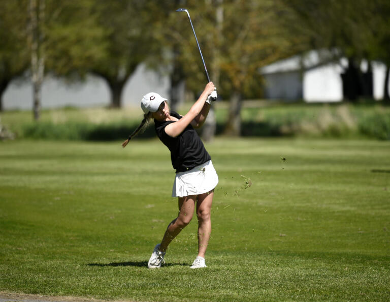 Jacinda Lee of Camas hits a shot on the 16th hole at Mint Valley Golf Course in Longview at the 4A girls golf district tournament on Wednesday, May 10, 2023.