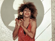 FILE - Tina Turner, Pop and R&amp;B vocalist, as holds up a Grammy Award, Feb. 27, 1985, in Los Angeles. Turner, the unstoppable singer and stage performer, died Tuesday, after a long illness at her home in Küsnacht near Zurich, Switzerland, according to her manager.