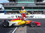 Josef Newgarden celebrates on the finish line after winning the Indianapolis 500 auto race at Indianapolis Motor Speedway in Indianapolis, Sunday, May 28, 2023.