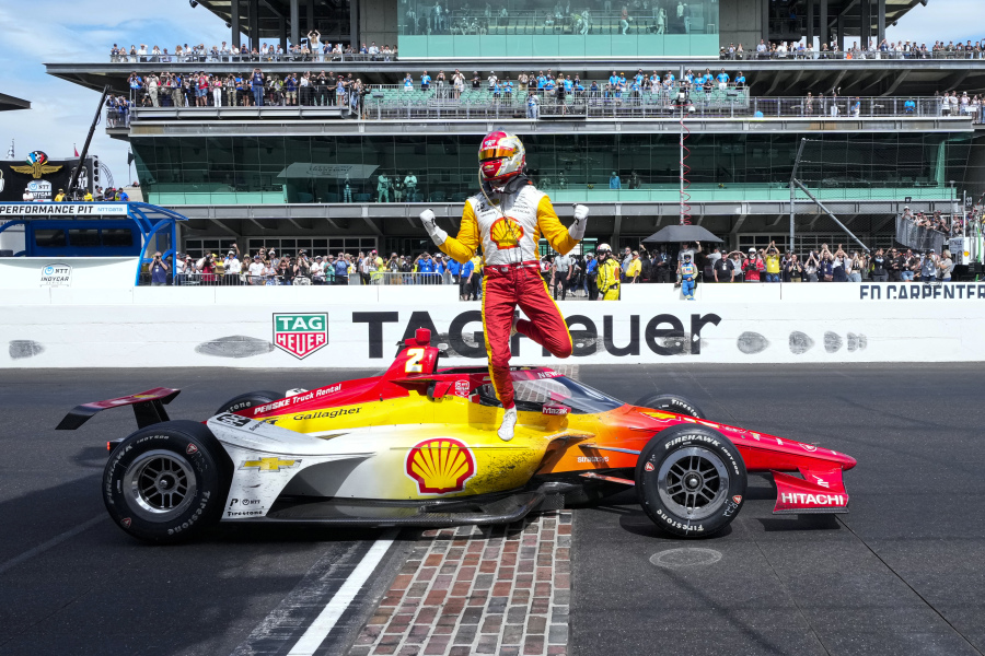 Josef Newgarden celebrates on the finish line after winning the Indianapolis 500 auto race at Indianapolis Motor Speedway in Indianapolis, Sunday, May 28, 2023.