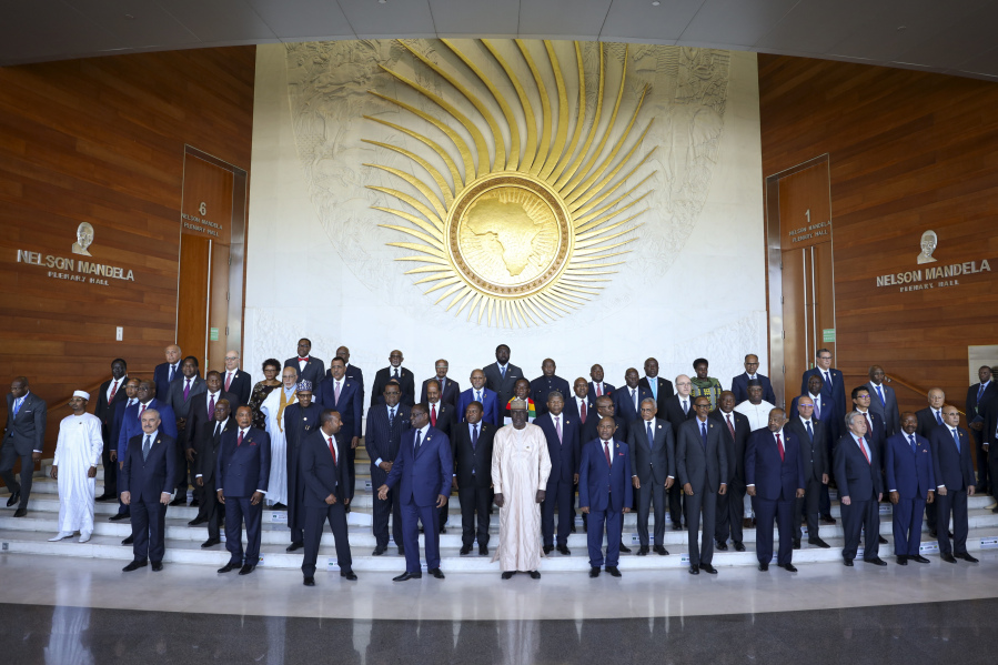 FILE - Leaders gather for a group photo at the African Union Summit in Addis Ababa, Ethiopia, on Feb. 18, 2023. Calls for unity dominated the 60th anniversary celebrations on Thursday, May 25, 2023 for the continent-wide organization preceding the African Union (AU) but critics say the AU has become a paper tiger where there's plenty of talk, but not much much real clout to enforce its mandate.