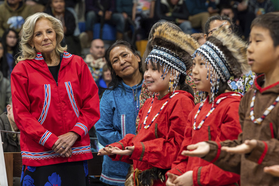 U.S. first lady Jill Biden, left, and first lady of Alaska Rose Dunleavy watch a performance by Ayaprun Elitnaurvik students during an event at Bethel Regional High School in Bethel, Alaska on Wednesday, May 17, 2023. Ayaprun Elitnaurvik is a Yugtun immersion school in Bethel. Biden and Interior Secretary Deb Haaland traveled to Bethel to highlight the Biden-Harris administration's investments to expand broadband internet connectivity in Native American communities, including Alaska's Yukon-Kuskokwim Delta.