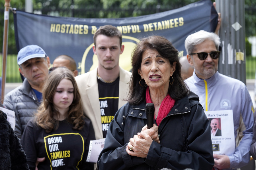 Diane Foley, right, mother of James Foley, who was kidnapped and beheaded by Islamic State militants in 2014 while reporting on the conflict in Syria, speaks outside the White House in Washington, Wednesday, May 3, 2023, asking the Biden administration to help free hostages and detainees.